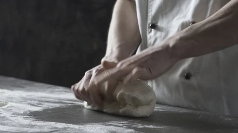 Professional cook preparing fresh pizza and kneading the dough Stock Footage 127414537