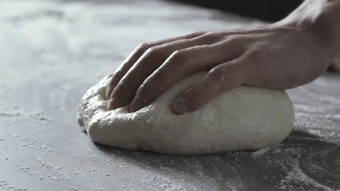 Professional cook preparing fresh pizza and kneading the dough Stock Footage 127414557