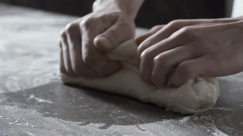 Professional cook preparing fresh pizza and kneading the dough Stock Footage 127414572