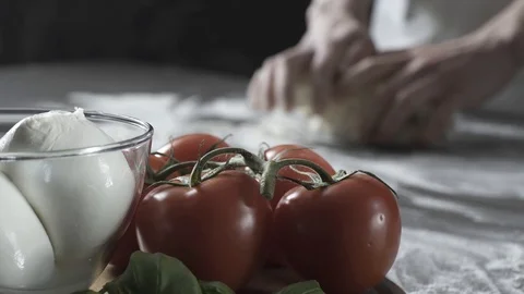 Professional cook preparing fresh pizza and kneading the dough Stock Footage 127414591