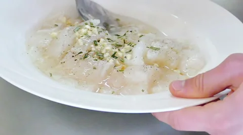 Professional Cook Spills Fish with Oil on the Plate in Slow Motion Stock-Footage 59591646