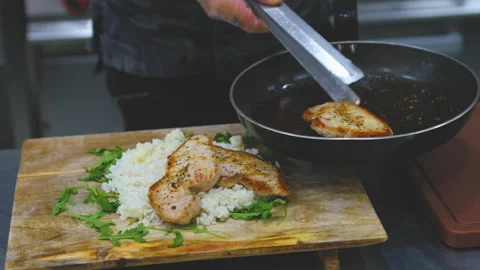 Professional cook at work Stock Footage 157558536