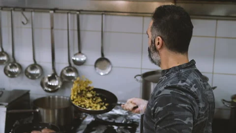 Professional cook at work Stock Footage 157559600