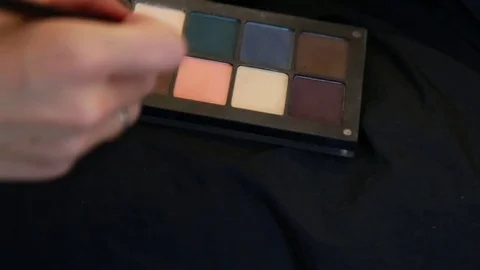 Professional corrector palette with make-up brush, closed-up Stock Footage 69772105