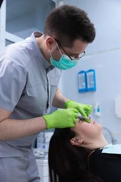 Professional Cosmetic Procedure in Progress: A Close-Up of a Skilled Stock Photos