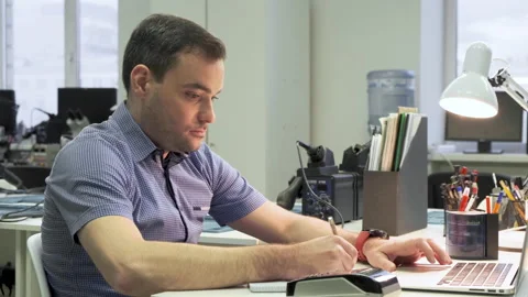 Professional Creative Man Sitting at His Desk in Home Office Studio Working Stock Footage 132999876