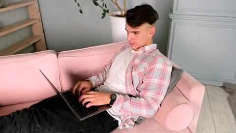 Professional Creative Man Sitting at home remote working, typing on laptop Stock Footage 161838975