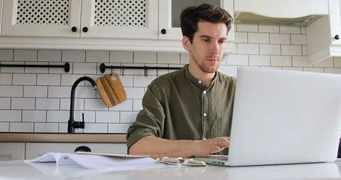 Professional Creative Man Sitting Working at Kitchen Desk in Home Office Studio Stock Footage 127643835