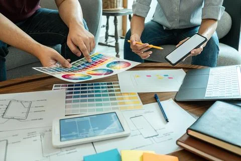 Professional Creative Team of Web/Graphic Designer planning, drawing websit.. Stock Photos