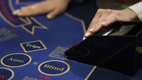 Professional croupier shuffling cards on table in casino, poker game. Close-up Stock Footage 132063519