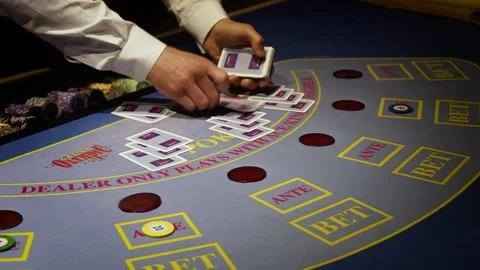 Professional Croupier Shuffling Cards On Table In Casino, Poker Game Stock Footage 238867178