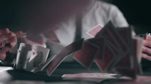 A professional croupier is working and shuffling with cards. Close up of holdem Stock Footage 152911251