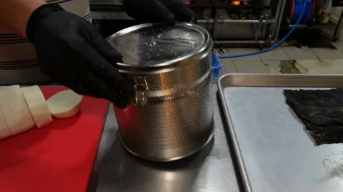 Professional culinary preparation of soup ingredients inside commercial kitchen Stock Footage 345510302