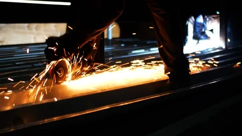 Professional cut metal by grinder tool outside at night on a roof Stock Footage 292936508