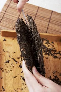 Professional cutting Pu'er tea Stock Photos