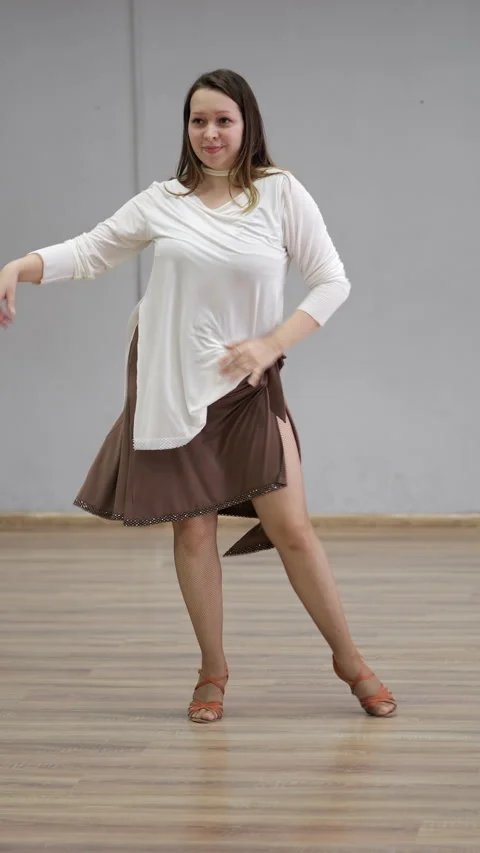 Professional dancer performing margarita steps in dance studio Stock Footage 308960869