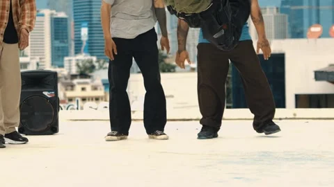 Professional dancer practice B boy dance with friends at roof top. hiphop. Stock Footage 258634578