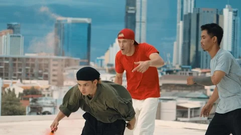 Professional dancer practice B boy dance with friends at roof top. hiphop. Stock Footage 262647244