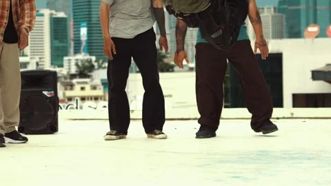 Professional dancer practice B boy dance with friends at roof top. hiphop. Stock Footage 269547266