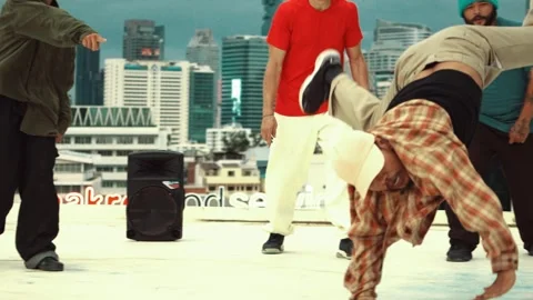Professional dancer practice B boy dance with friends at roof top. hiphop. Stock Footage 272669069