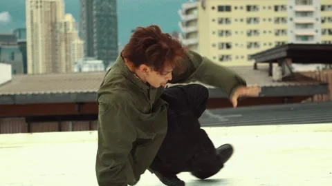 Professional dancer practice B boy dance with friends at roof top. hiphop. Stock Footage 272889315