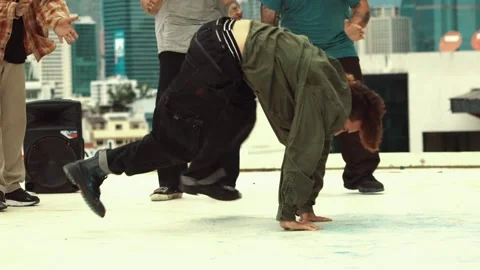 Professional dancer practice B boy dance with friends at roof top. hiphop. Stock Footage 274252776