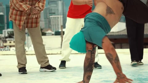 Professional dancer practice B boy dance with friends at roof top. hiphop. Stock Footage 275012823