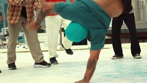 Professional dancer practice B boy dance with friends at roof top. hiphop. Stock-Footage 276568328