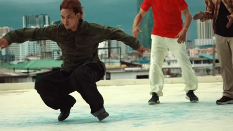 Professional dancer practice B boy dance with friends at roof top. hiphop. Stock-Footage 277218157