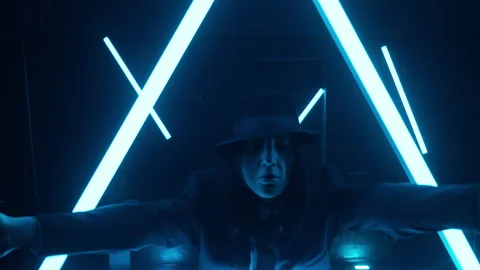 Professional dancer in suit dancing hip hop in dark studio. Young woman dancing Video stock 181401430