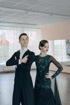 Professional dancers dancing in ballroom Stock Photos