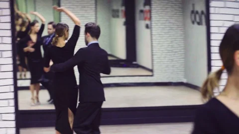 Professional dancers dancing tango in ballroom. Stock-Footage 89381489
