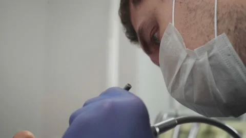Professional dentist is using multiple specialised tool for patient treatment Video stock 200872618