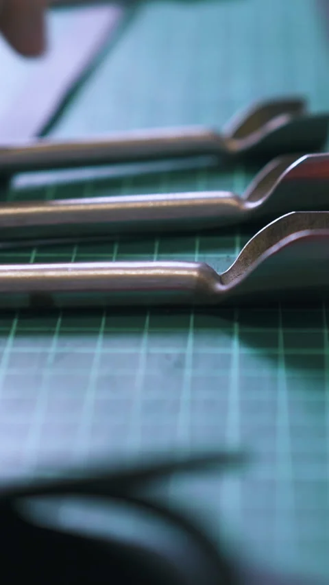 Professional designer puts different steel corner cutters Stock Footage 317090536