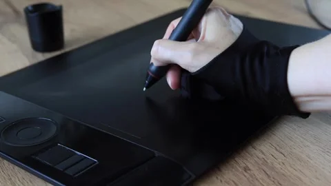 Professional designer working on a digital tablet. Creative designer hand Stock Footage 340285009