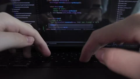 Professional developer hands typing programming code on a laptop keyboard, .. Vídeos de archivo 311932086