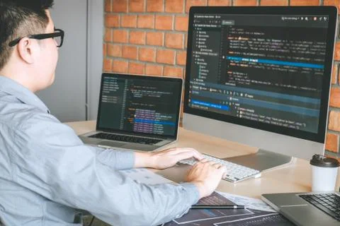 Professional Developer programmer working a software website design and codin Stock Photos