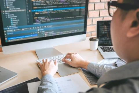 Professional Developer programmer working a software website design and codin Stock Photos