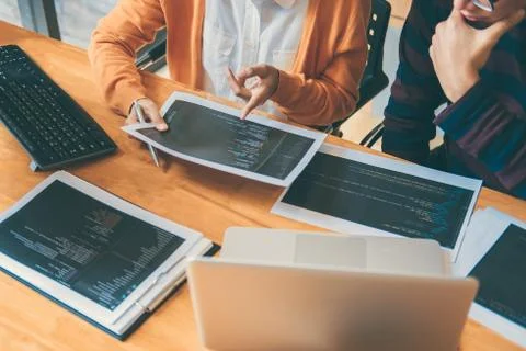 Professional Development programmer cooperating meeting and brainstorming and Stock Photos
