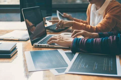 Professional Development programmer cooperating meeting and brainstorming and Stock Photos