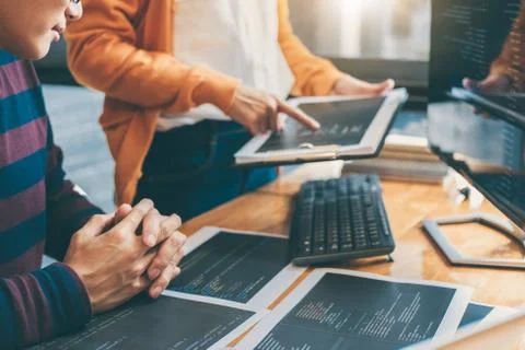 Professional Development programmer cooperating meeting and brainstorming and Stock Photos