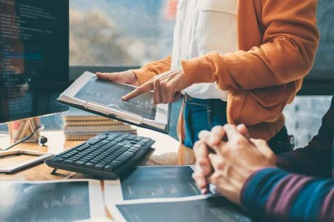 Professional Development programmer cooperating meeting and brainstorming and Stock Photos