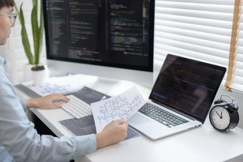 Professional development programmers are analyzing the information in documen 스톡 사진