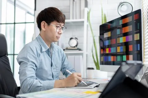 Professional development programmers are choosing color schemes to decorate t 스톡 사진