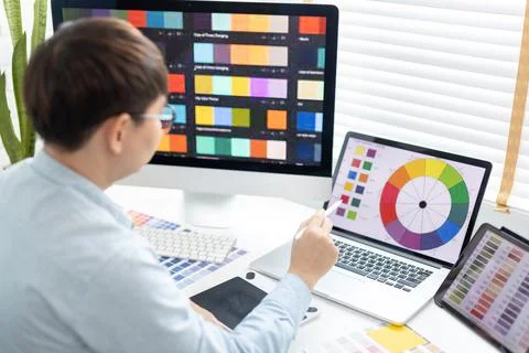 Professional development programmers are choosing color schemes to decorate t Stock-Fotos