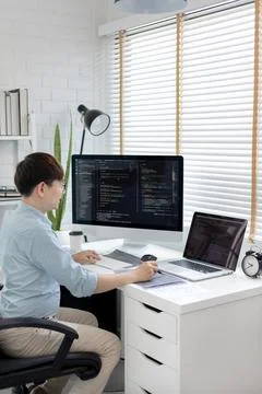 Professional development programmers are laying out a structure or draft on p Stock-Fotos