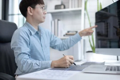 Professional development programmers are laying out a structure or draft on p Stock Photos