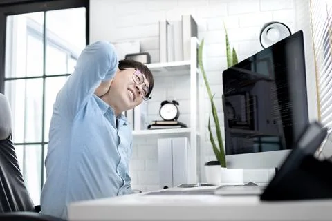 Professional development programmers are suffer from backaches or twists or s Stock-Fotos