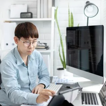 Professional development programmers are using tablet to test the functionali 스톡 사진