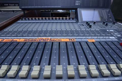 Professional digital audio mixing console in a television broadcasting studio Stock Photos